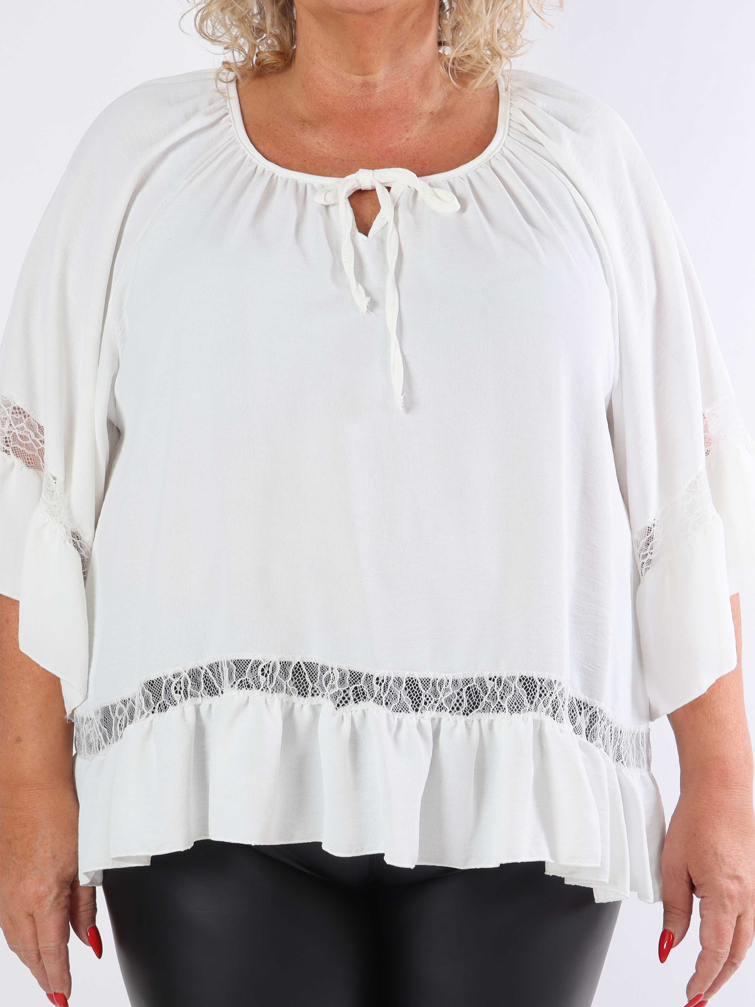 Achilla - Plus size-tunika med spetskant och volanger
